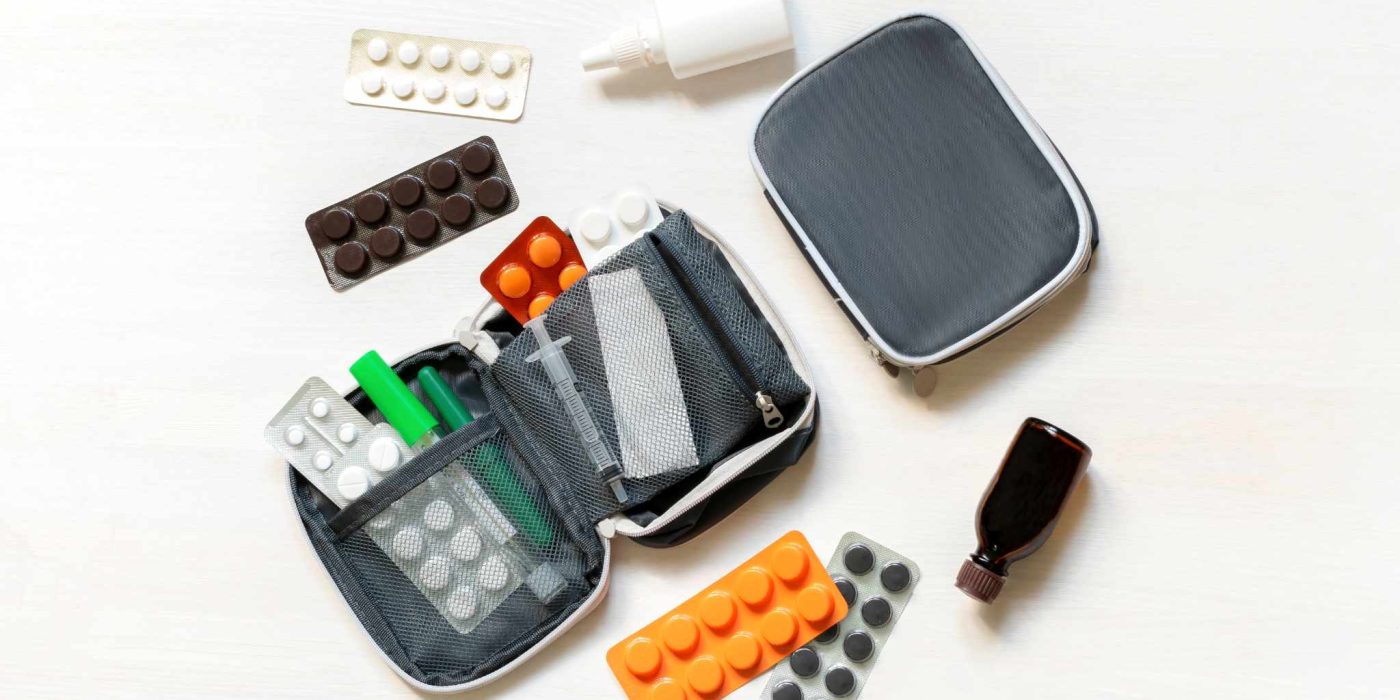 daily medicine chest, container of pills, tablets, vitamins, travel first aid kit. pill box dispenser medications, nutritional supplements. medical treatment for disease virus dosage of medicine