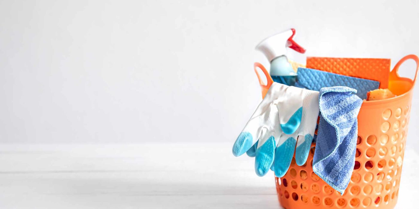 home cleaning and cleaning basket copy space.