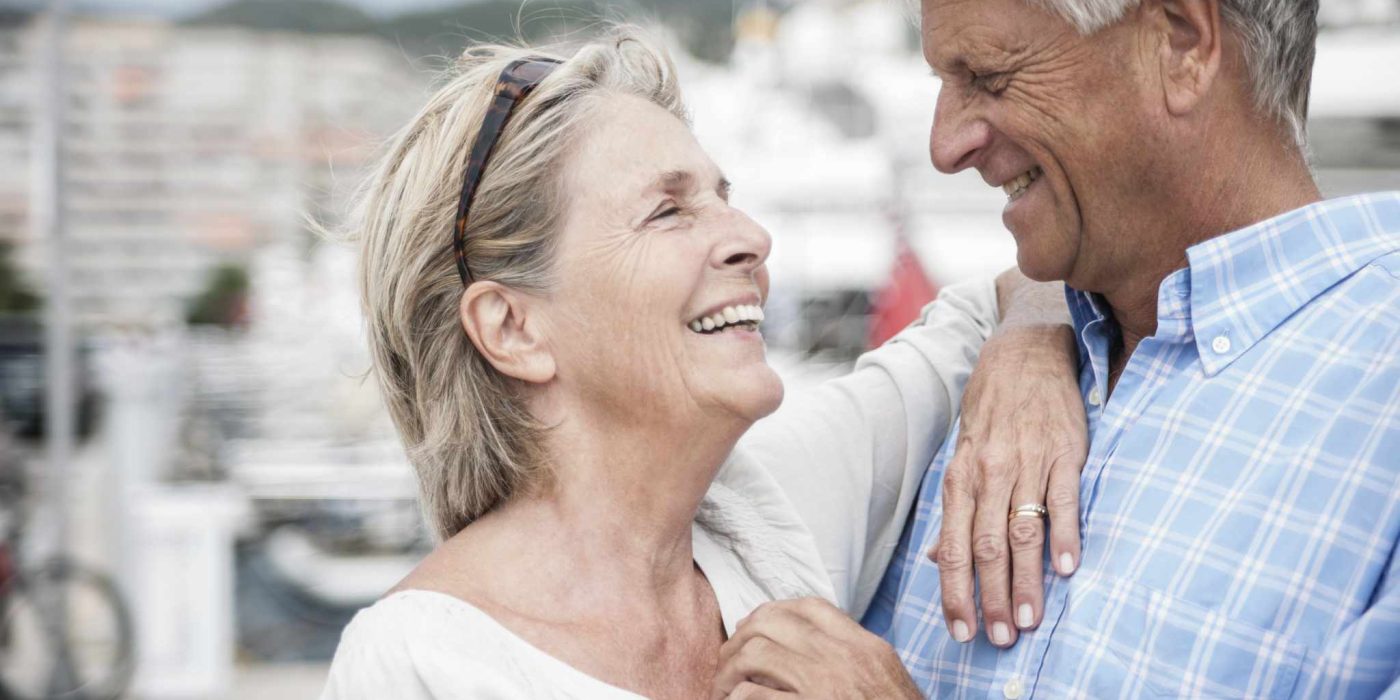 spain, senior couple at harbour