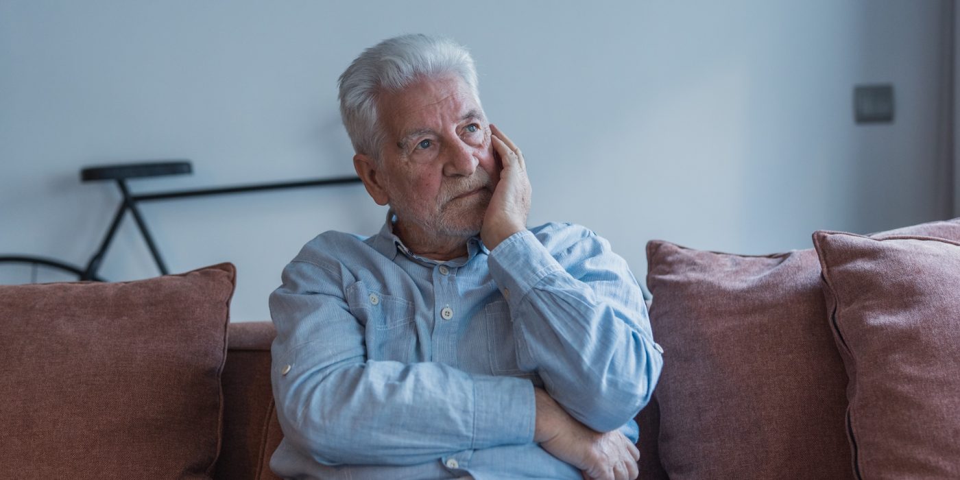 thoughtful senior man sitting on sofa at home 2026 05 25 17 54 44 utc