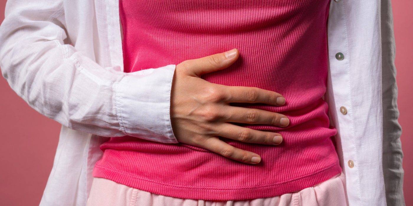 Woman holding her stomach due to painful cramps March 24, 2026, 05:32:08 UTC